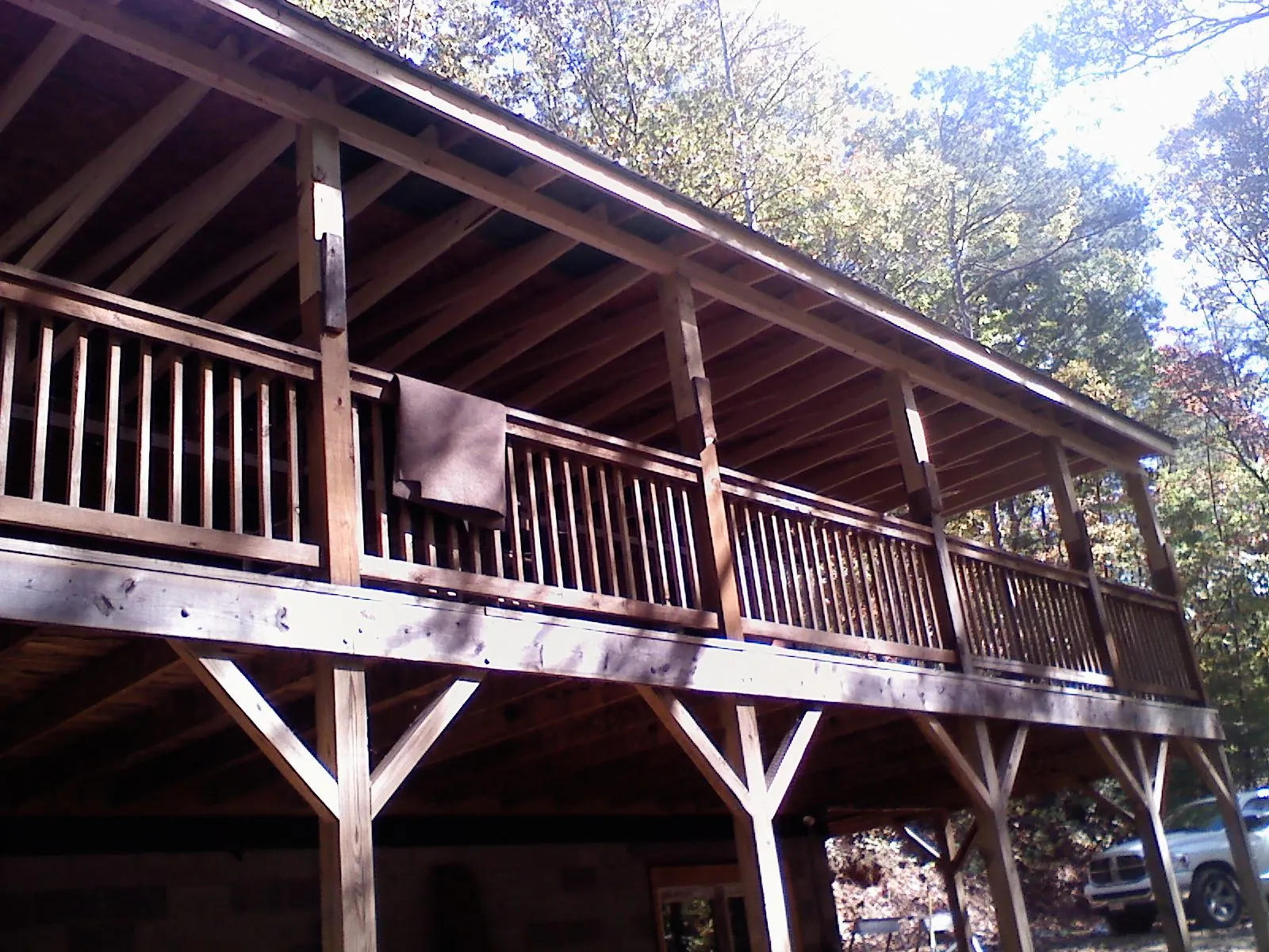 Timber framing under a new elevated porch and deck — Roof Leak Repair in Romulus by Roofing Brothers